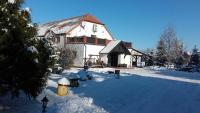 Hotel Stara Stajnia v zime