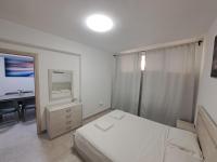 A bed or beds in a room at SYKA Thassos - Villa 4 Rooms SKALA RACHONIOU