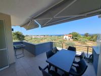 A balcony or terrace at SYKA Thassos - Villa 4 Rooms SKALA RACHONIOU