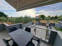 A balcony or terrace at SYKA Thassos - Villa 4 Rooms SKALA RACHONIOU