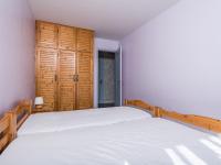 Łóżko lub łóżka w pokoju w obiekcie Appartement lumineux proche pistes, commerces, balcon - FR-1-502-408