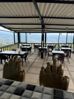 Ecohotel Sky Green Pereira餐廳或用餐的地方