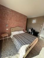 Posteľ alebo postele v izbe v ubytovaní Residence Giove