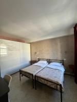 Posteľ alebo postele v izbe v ubytovaní Residence Giove
