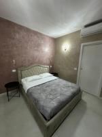 Posteľ alebo postele v izbe v ubytovaní Residence Giove