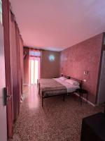 Posteľ alebo postele v izbe v ubytovaní Residence Giove