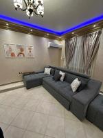 Posezení v ubytování ENG01-Luxury Hotel-Style Apartment in Villa East of the Academy New Cairo