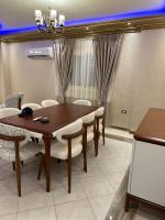 Posezení v ubytování ENG01-Luxury Hotel-Style Apartment in Villa East of the Academy New Cairo
