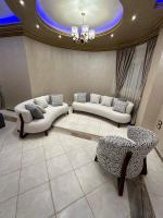Posezení v ubytování ENG01-Luxury Hotel-Style Apartment in Villa East of the Academy New Cairo