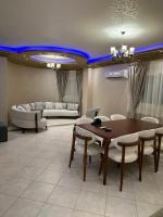 Posezení v ubytování ENG01-Luxury Hotel-Style Apartment in Villa East of the Academy New Cairo