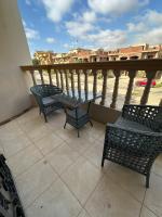 Balkón nebo terasa v ubytování ENG01-Luxury Hotel-Style Apartment in Villa East of the Academy New Cairo