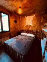 Łóżko lub łóżka w pokoju w obiekcie Western Apartments Sierra de Madrid