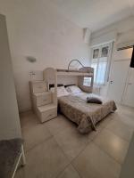 Posteľ alebo postele v izbe v ubytovaní Home il Piccolo Nido