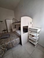 Posteľ alebo postele v izbe v ubytovaní Home il Piccolo Nido