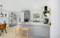 Kuchyň nebo kuchyňský kout v ubytování Holiday Home Grønnevænget Blåvand Ix