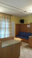 Televízia a/alebo spoločenská miestnosť v ubytovaní Chalet Heidi