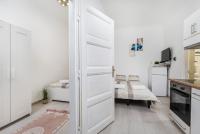 Posteľ alebo postele v izbe v ubytovaní Real Apartments Kertész II.