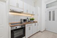 Kuchyňa alebo kuchynka v ubytovaní Real Apartments Kertész II.