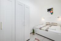 Posteľ alebo postele v izbe v ubytovaní Real Apartments Kertész II.