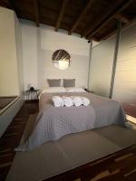 A bed or beds in a room at Antica corte Navigli-Darsena