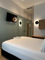 Posteľ alebo postele v izbe v ubytovaní Belle Athenes - Luxury Rooms at Monastiraki Railway Station