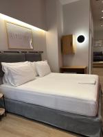 Posteľ alebo postele v izbe v ubytovaní Belle Athenes - Luxury Rooms at Monastiraki Railway Station