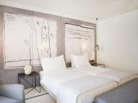 Posteľ alebo postele v izbe v ubytovaní Hotel Kompas