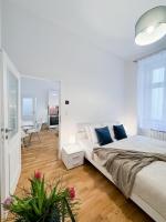 Postel nebo postele na pokoji v ubytování TurnKey I Wenceslas Square Apartments