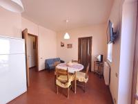 A television and/or entertainment centre at Mirèa Apartment by Casa in mente