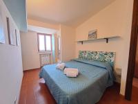 A bed or beds in a room at Mirèa Apartment by Casa in mente
