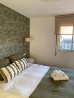 Postel nebo postele na pokoji v ubytování Apartment Sky Cervantes