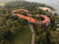 an overhead view of a building in the middle of a park at Capella Singapore in Singapore