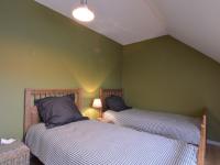 Una cama o camas en una habitaci&oacute;n de Modern Home in Geel with Sauna