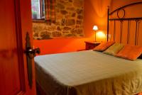 Postel nebo postele na pokoji v ubytování Casa Rural La Lastría