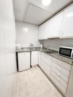 A kitchen or kitchenette at Aparthotel Solifemar