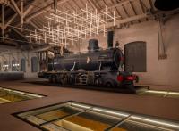 uma antiga locomotiva a vapor em exposição em um museu em The Chedi Hegra, AlUla em Al Ula