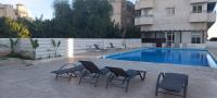 Bazén v ubytování Palm Beach Apartment 26 nebo v jeho okolí