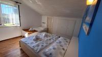 Posteľ alebo postele v izbe v ubytovaní Apartments Ankica