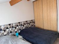 Posteľ alebo postele v izbe v ubytovaní Maison avec grande terrasse à 100m de la plage