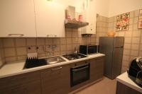 Kuchyňa alebo kuchynka v ubytovaní Vittori Apartment