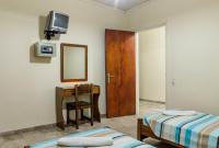 A bed or beds in a room at Borsalino Studios & Apartments