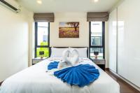 Postel nebo postele na pokoji v ubytování Phuket villa in Laguna Park