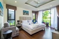 Postel nebo postele na pokoji v ubytování Phuket villa in Laguna Park