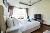 TV a/nebo společenská místnost v ubytování Phuket villa in Laguna Park