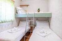 Posteľ alebo postele v izbe v ubytovaní Club del Sole Rivaverde Easy Camping Village