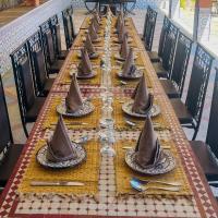 Veitingastaður eða matsölustaður á tifrit maison d'hôtes-Paradise valley