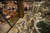 a view of a restaurant with a motorcycle in a room at Wilson Palace by LOFT in Bratislava