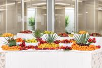 a display of fruits and vegetables in bowls on a table at VOI Alimini Resort in Alimini