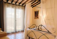 A bed or beds in a room at Agriturismo San Sano