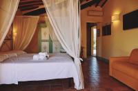 A bed or beds in a room at Agriturismo San Sano